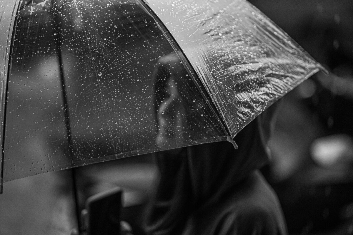 tropical rain shower singapore street umbrella